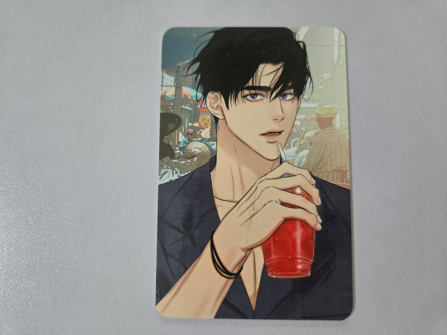 Illustration of Jitae holding a red drink 