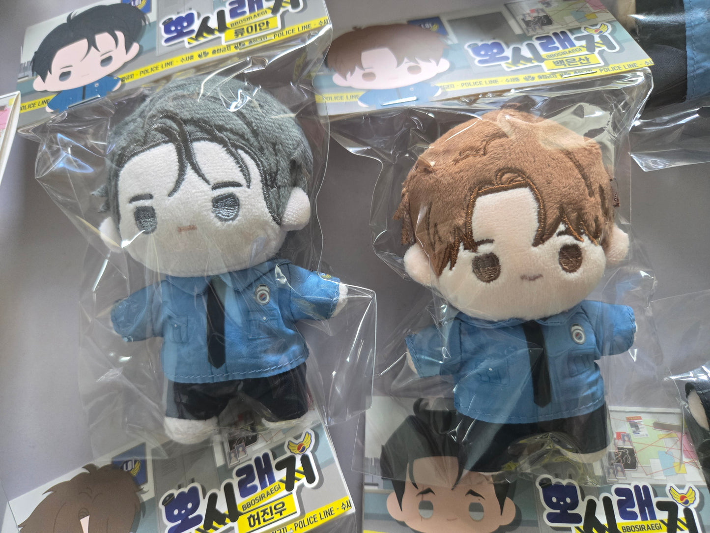 Melting Point plush dolls in retail packaging, featuring Ryu Ian and Eunsan
