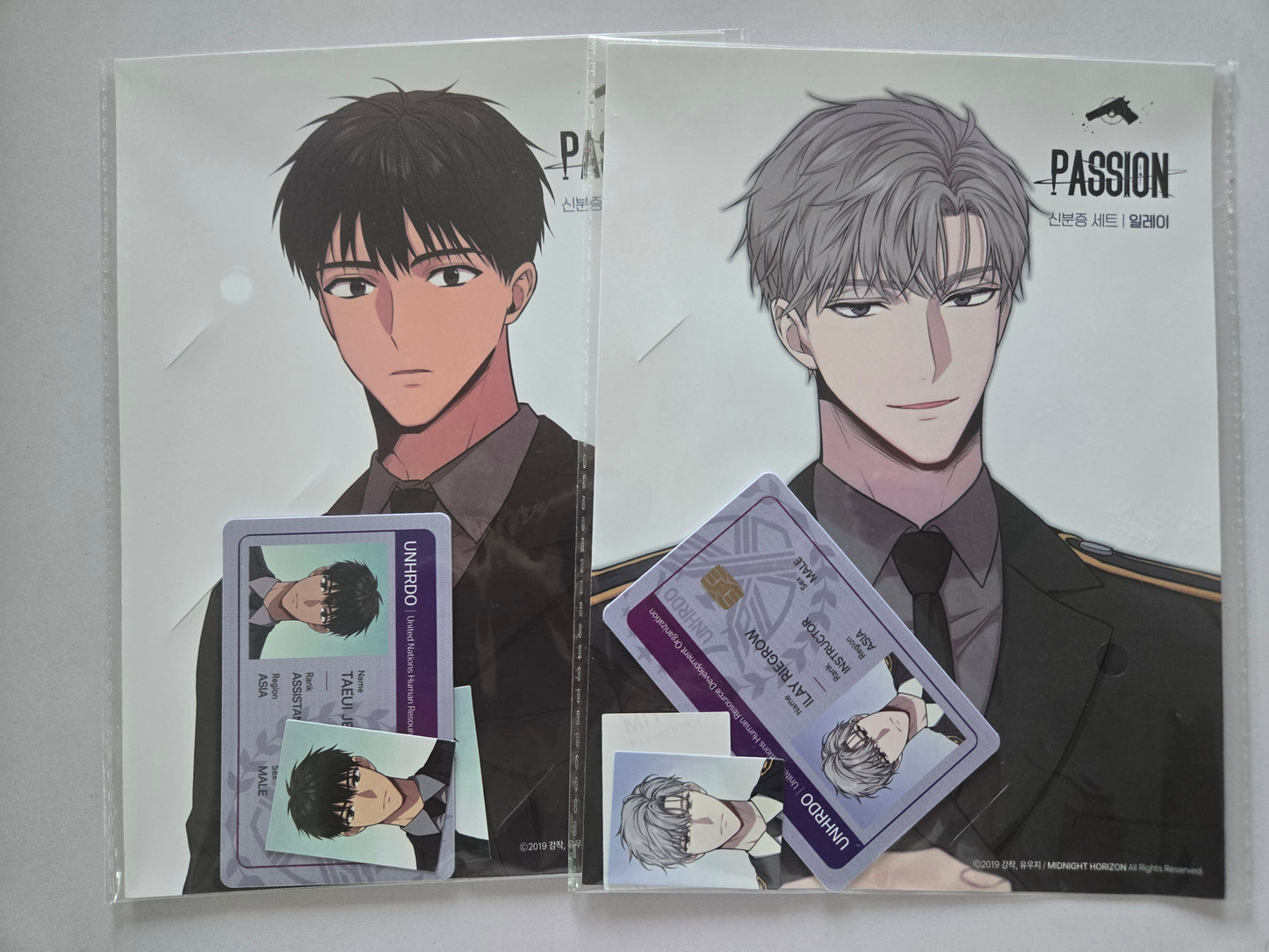 Ilay and Taeui ID card displayed side by side