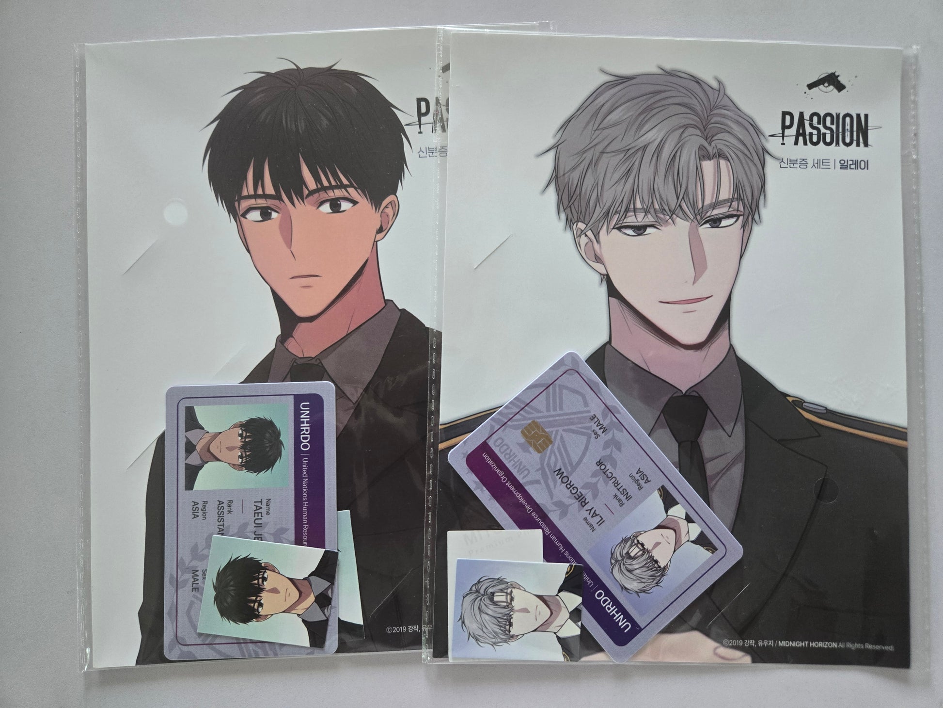 Ilay and Taeui ID card displayed side by side