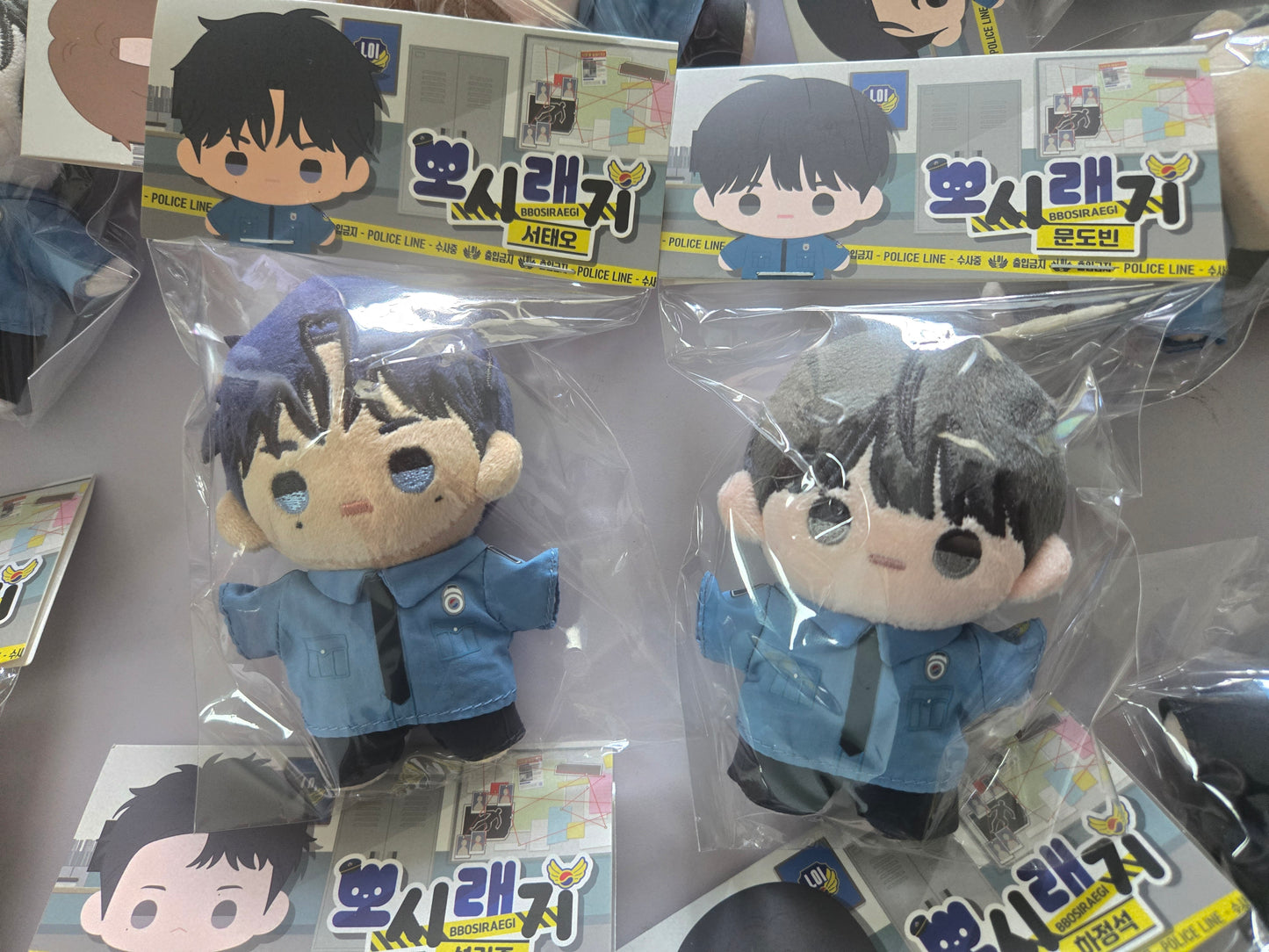 Scent and Sensibility plush dolls in retail packaging, featuring Tae-oh and Dobin