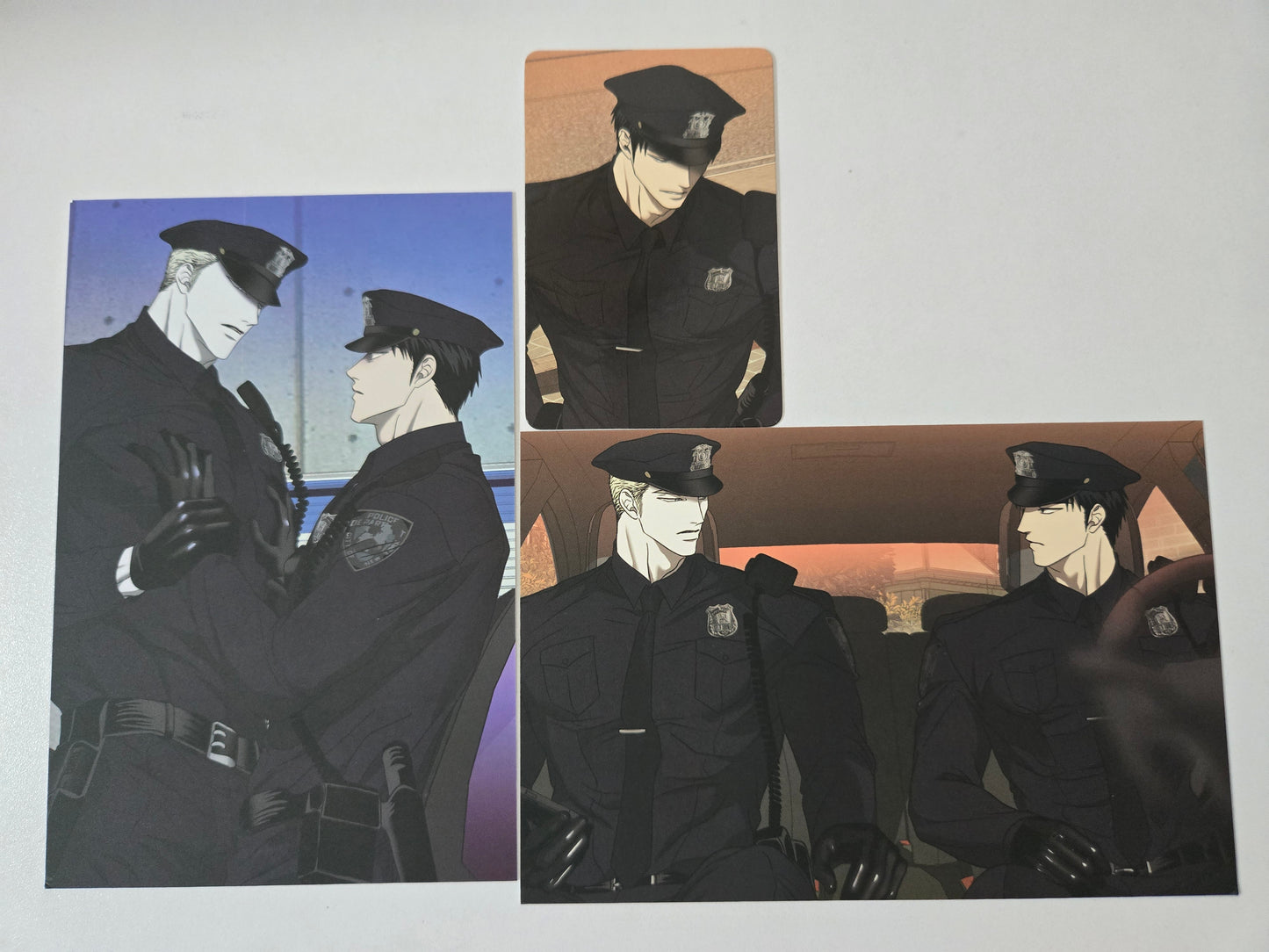 Shutline merchandise featuring the couple in police officers uniform