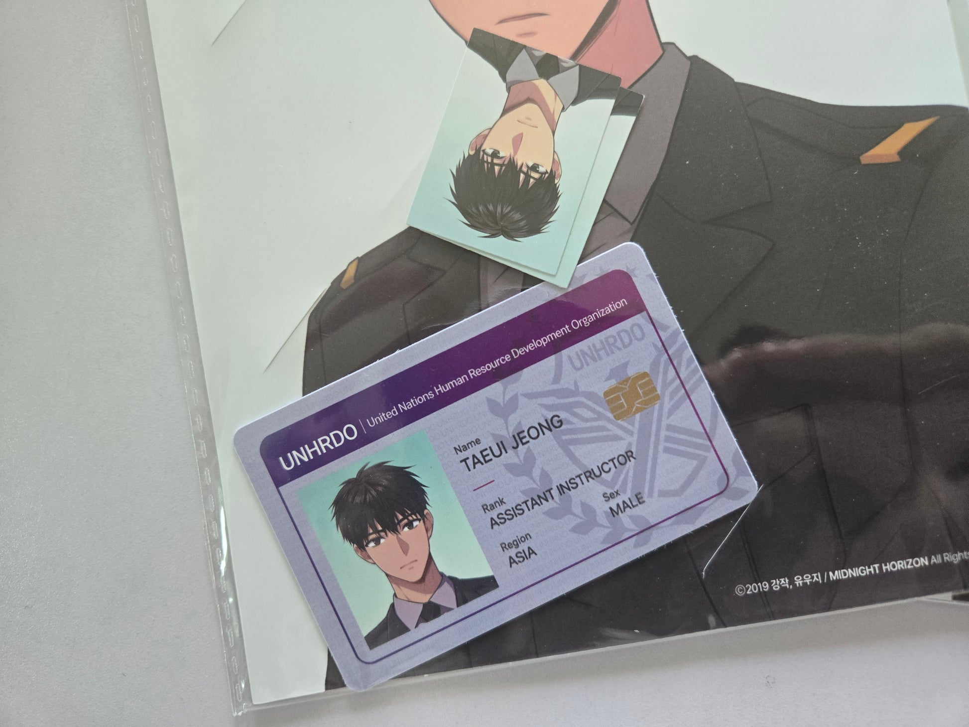 close-up of Jeong Taeui UNIDRO ID card