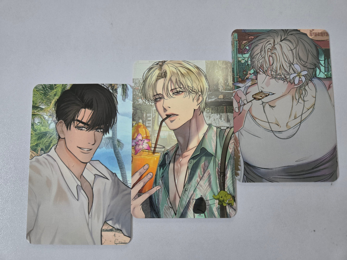 Three illustrated cards featuring YoonJay Han Seoin Yeo Taeju