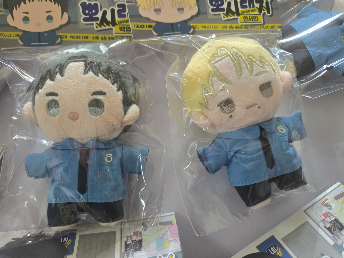 Backlight plush dolls in retail packaging, featuring Seoin and Yeongwoon